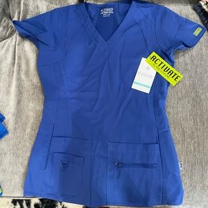 Med couture activate XS galaxy blue scrub top.